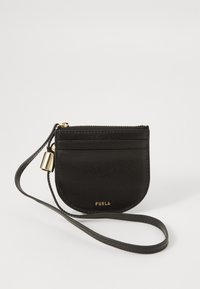 Black leather pouch with a rounded shape, featuring a zip closure and a gold-tone lock accent. It has a detachable strap and a smooth texture.
