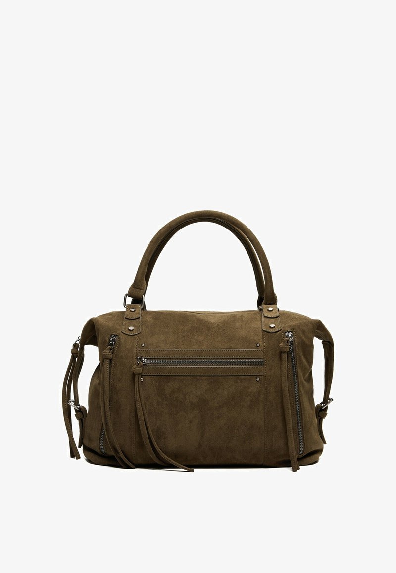 Sac à main en daim marron avec deux poignées, poches zippées à l'avant et sur les côtés, et longues languettes en cuir sur fond blanc.
