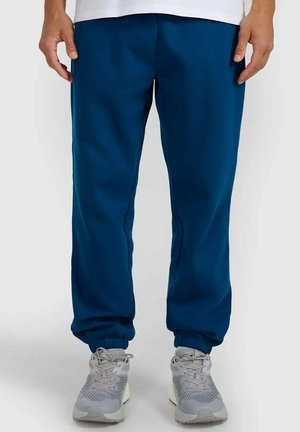 - Spodnie treningowe