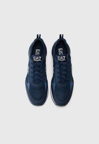 Navy athletic sneakers with a mesh and synthetic upper, featuring a lace closure, logo details, and a textured sole for grip.