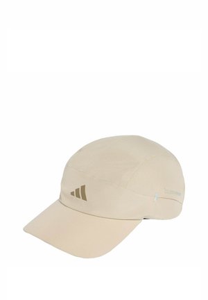 Casquette beige légère avec visière courbée et petit logo triangulaire à l'avant, conçue pour la protection solaire et la respirabilité.