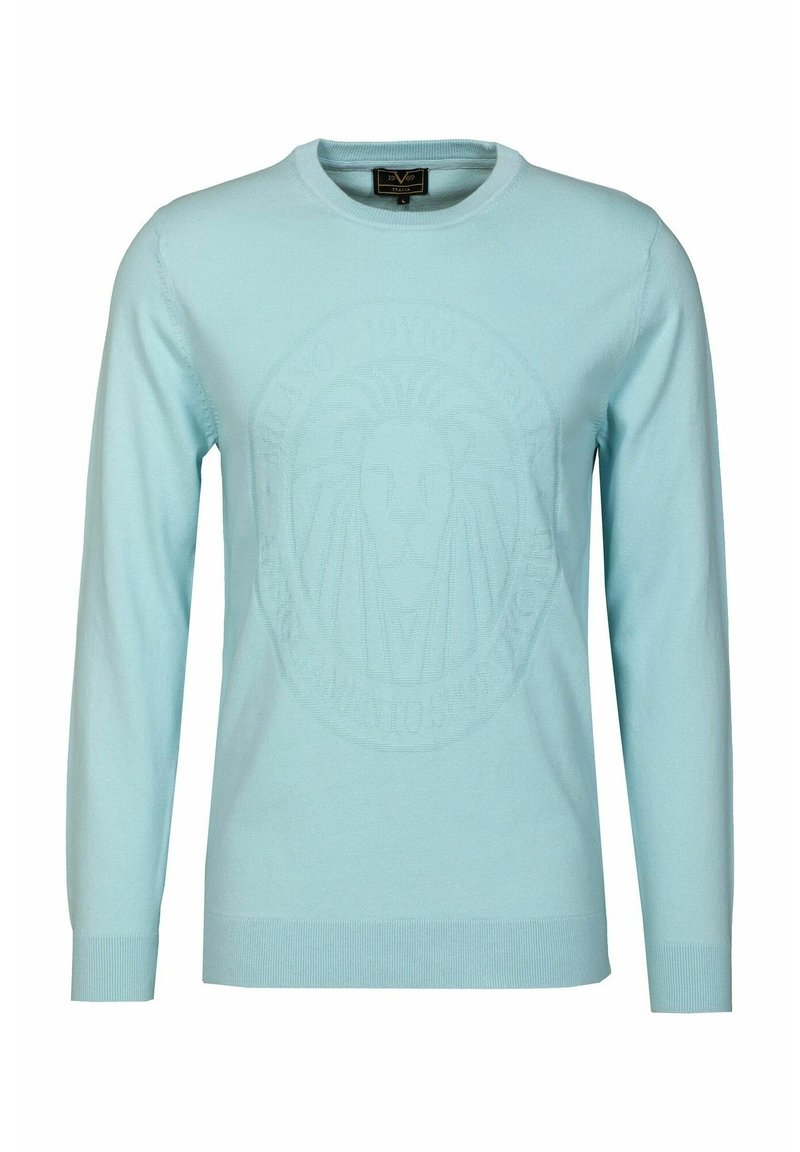 Pull en tricot bleu clair à manches longues et col rond. Il présente un logo de lion embossé au centre et des poignets côtelés.