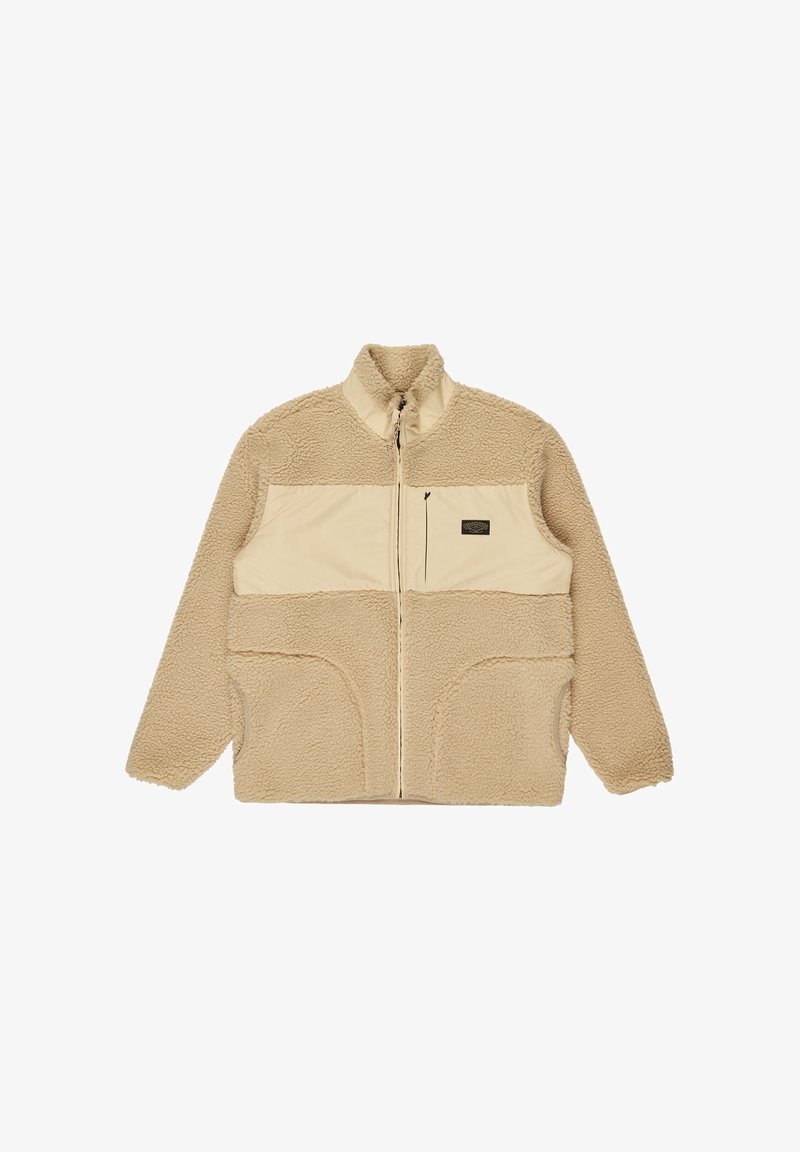 Giacca in pile beige con una parte superiore in nylon liscio e un colletto alto. Presenta una chiusura a zip e due tasche laterali con bordi arrotondati.