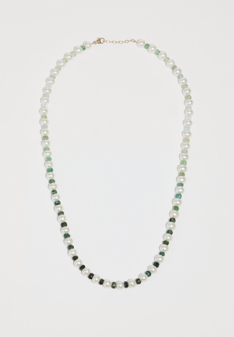 Perlekæde med vekslende hvide perler og grønne/gule perler. Sikker med en guldkrog. Inkluderer glatte og strukturerede variationer.