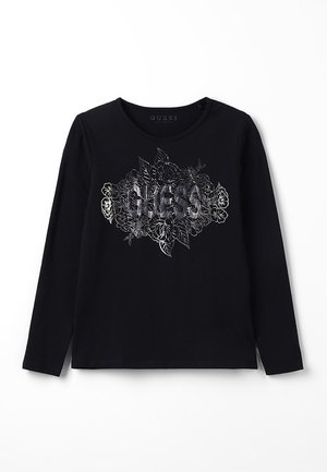 Sort langærmet skjorte med rund halsudskæring med skinnende blomsterdesign og "GUESS" logo i midten foran.
