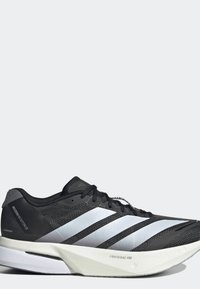 Chaussure de course Adidas Adizero Boston 13 noire et blanche avec semelle Lightstrike Pro et lacets noirs sur fond uni.