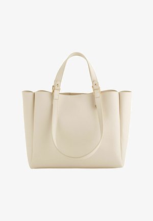 Beige leather tote bag with structured sides, two shoulder straps, and gold-tone hardware accents.