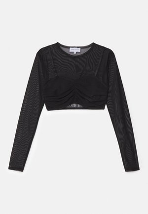 Crop top noir à manches longues en tissu mesh transparent, avec un détail froncé au niveau de la poitrine et une coupe ajustée. Étiquette visible au niveau du cou.