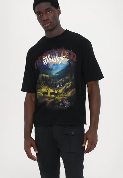 Black cotton t-shirt featuring a colorful mountain landscape graphic with deer. Short sleeves and relaxed fit design.