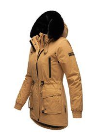 Tan winter jacket with a black faux fur hood. Features zippered and snap pockets, elastic cuffs, and a cinched waist for warmth.