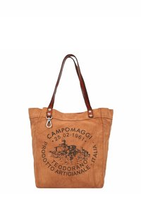 Beige canvas tas met bruine leren hengsels, met een zwarte gedrukt afbeelding van een kasteel en merktekst aan de voorzijde.