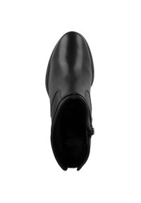 Botín negro con cuero liso, puntera redondeada, cierre de cremallera en el lateral y planta acolchada. Diseño clásico para un uso versátil.