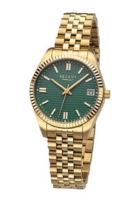 Montre dorée avec un cadran vert tissé, des marqueurs d'heure audacieux et un affichage de la date. Elle dispose d'un bracelet métallique et de détails texturés sur la lunette.