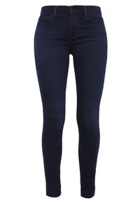 Mörkblå denim skinny jeans med en åtsittande design, femficksstil, framknäppning med knapp och dragkedja samt minimala sömdetaljer.