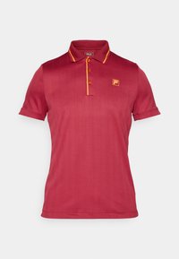 Red polo shirt with short sleeves, vertical ribbed pattern, yellow accents on collar and buttons, and a small logo on the chest.