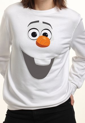 Biała bluza z dużą, karykaturalną twarzą bałwana z szerokimi oczami, pomarańczowym nosem w kształcie marchewki i dużym, uśmiechniętym ustami.