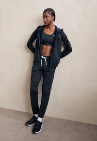 Under Armour RIVAL TRICOT TRACKSUIT SET - Verryttelypuku - black/white