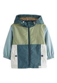Veste en color block avec un design vert, bleu clair et bleu foncé. Fabriquée en tissu anti-vent, elle est équipée d'une capuche et de poignets élastiques.