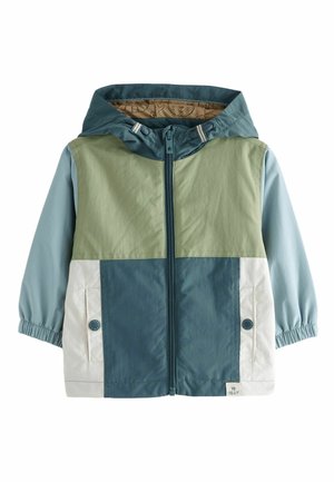 Veste en color block avec un design vert, bleu clair et bleu foncé. Fabriquée en tissu anti-vent, elle est équipée d'une capuche et de poignets élastiques.