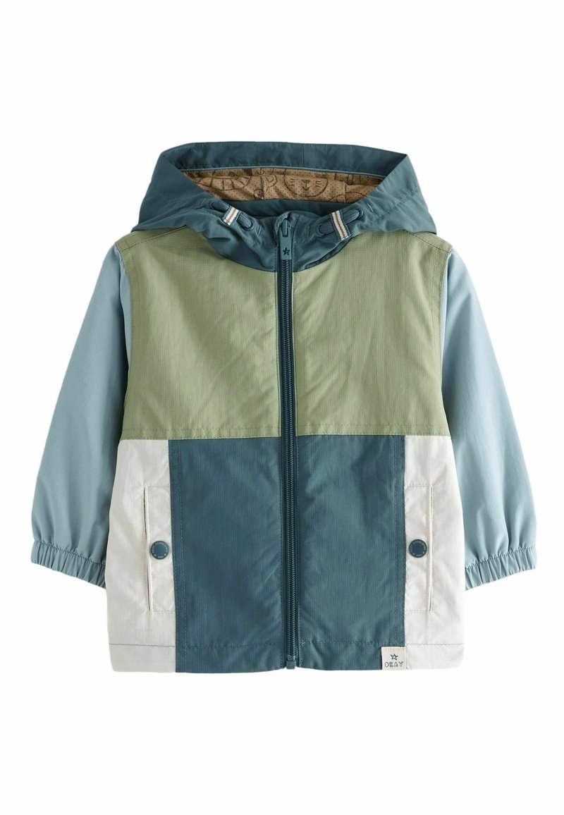 Veste en color block avec un design vert, bleu clair et bleu foncé. Fabriquée en tissu anti-vent, elle est équipée d'une capuche et de poignets élastiques.