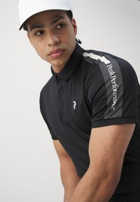 Peak Performance PLAYER - Poloshirts - black/motion grey