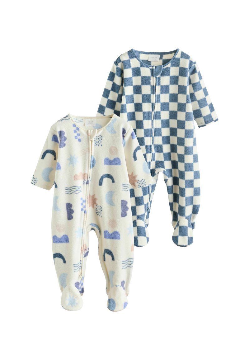 Två babykläder: en krämfärgad fleece med multikolorade abstrakta former, den andra i blå och vit rutigt mönster, båda med dragkedjor.