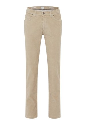 Beige Corduroyhosen mit geradem Schnitt. Sie verfügen über Taschen, eine dezente Ripptextur, einen Reißverschluss und einen Knopfverschluss.