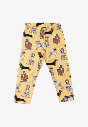 Pantalones amarillos para niños con cintura elástica, estampados con coloridos perros de dibujos animados que llevan sombreros y accesorios.