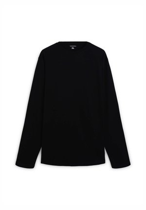 Maglietta nera a maniche lunghe in tessuto morbido, con collo tondo e vestibilità rilassata, con un'etichetta interna che legge "Terranova XL".