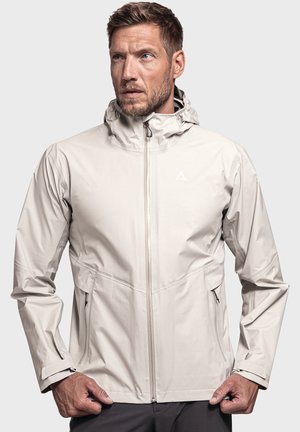Light beige waterproof jacket with a hood, front zipper, and side pockets. Smooth texture and modern design with subtle logo detail.