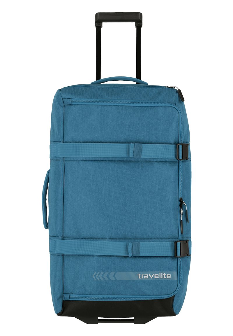 Valigia di tessuto blu con manico retrattile, due cinghie laterali, zip liscia, base nera e dettagli del logo sul davanti.