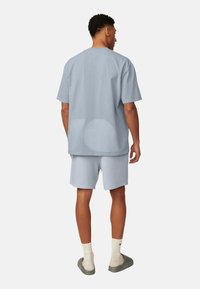 Kubota STATEMENT - T-shirt imprimé - light blue