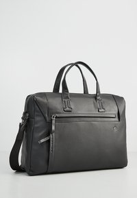 Black leather briefcase with dual top handles, textured accents, front zipper pocket, and detachable shoulder strap. Smooth, durable finish.