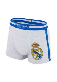 Białe slipy boxer z niebieskim paskiem w talii i bocznymi paskami, z logo Real Madrid i napisem "Real Madrid Since 1902" na pasku.