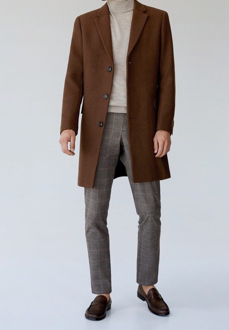 Brown wool coat, beige turtleneck, gray check-patterned trousers, brown loafers. Clean lines, tailored fit, textured fabrics.