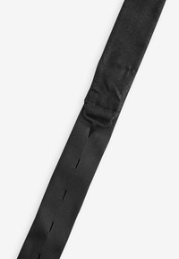 Next Fliege - black