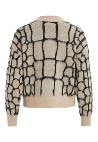 Pullover beige a forma quadrata con un motivo geometrico nero. Presenta un colletto rotondo e un tessuto a maglia testurizzato con orlo e polsini a costine.