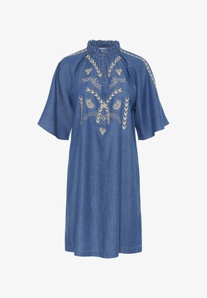 Teksari pluus lühikeste äärikute ja volangkaelusega. Ees on kuldsed lilleline tikandid ja vabalt langev lõige.