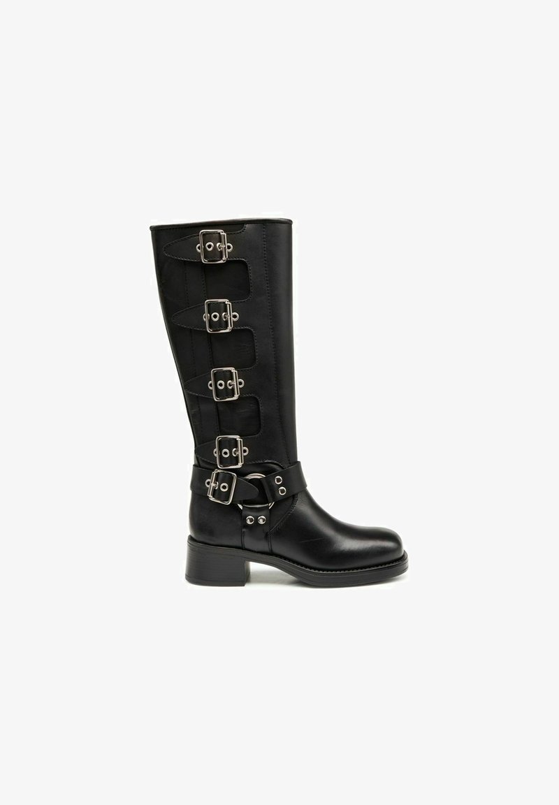 Black knee-high leather boot with multiple silver buckles and a chunky heel. Smooth texture and structured design, featuring a wide ankle strap.