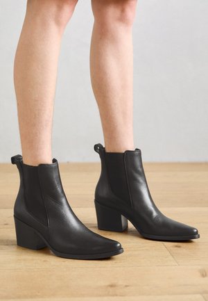 Botines camperos - black