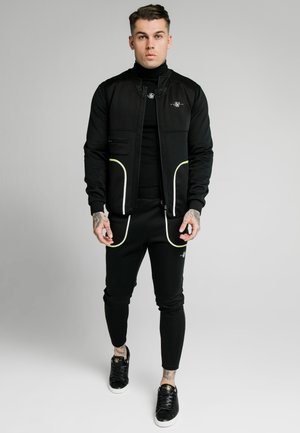 Smanicato - black & fluro white