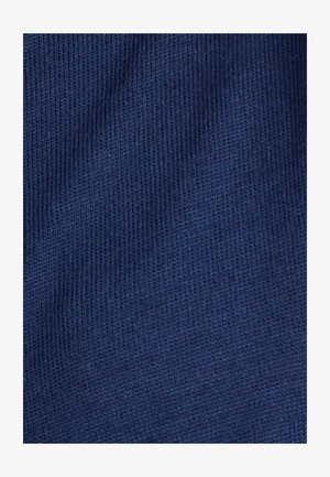 Tejido de punto azul marino con una textura suave y un patrón uniforme. La superficie presenta un ligero estriado y una trama consistente en toda su extensión.