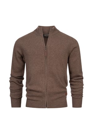 Cardigan marrone con zip, dalla texture a coste, colletto alto e maniche aderenti. Presenta una toppa con logo sul lato inferiore.