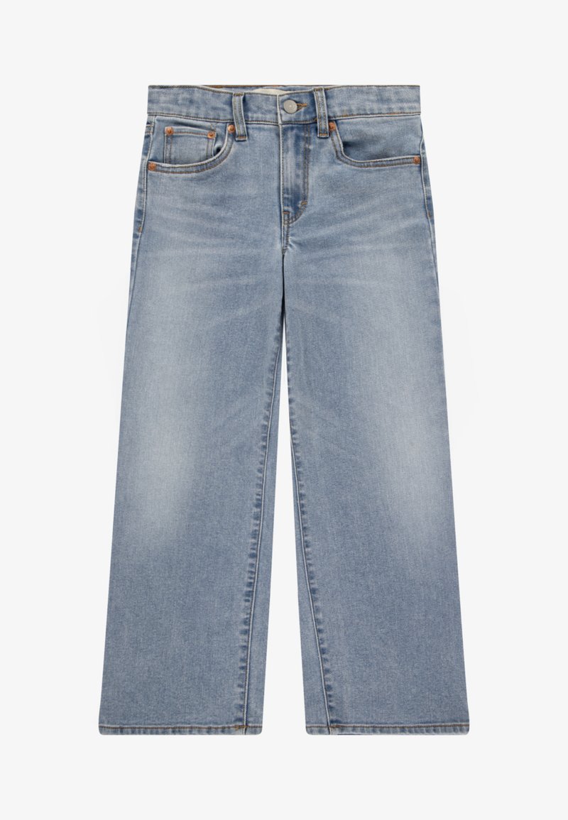 Jeans larges bleu clair en denim, dotés d'une fermeture à bouton, de cinq poches et d'un léger décoloration sur le tissu.