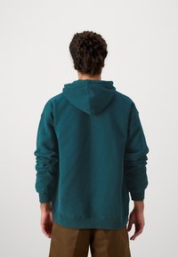 Rip Curl DOSED UP HOOD UNISEX - Sweatshirt - blue green