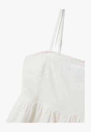 Witte mouwloze jurk met dunne verstelbare bandjes, gestructureerde stof en een gerimpelde zoom aan de onderkant.