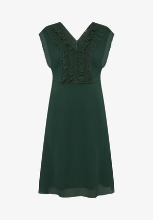 Donkergroene mouwloze jurk met V-hals en gelaagde volantdetails aan de voorkant en randen, met een ritssluiting aan de achterkant.