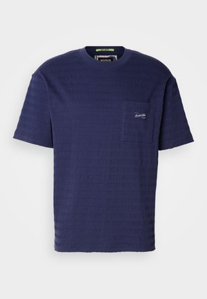 Navy blue short-sleeve t-shirt with a textured fabric, featuring horizontal stripes and a small chest pocket with a logo.