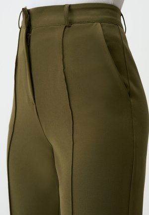 Olive green tailored trousers with a smooth texture, vertical seams, side pockets, and a zip closure at the waist.