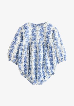 Berniuko smėlinukas ilgomis rankovėmis, su surinkta juosmens sritimi, elastingomis rankogaliais ir mėlynais gėlių vertikaliais dryžiais ant balto audinio.